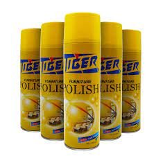 Five cans of Tiger Furniture Polish 550 ml for revitalizing wooden furniture with enhanced shine and protection.